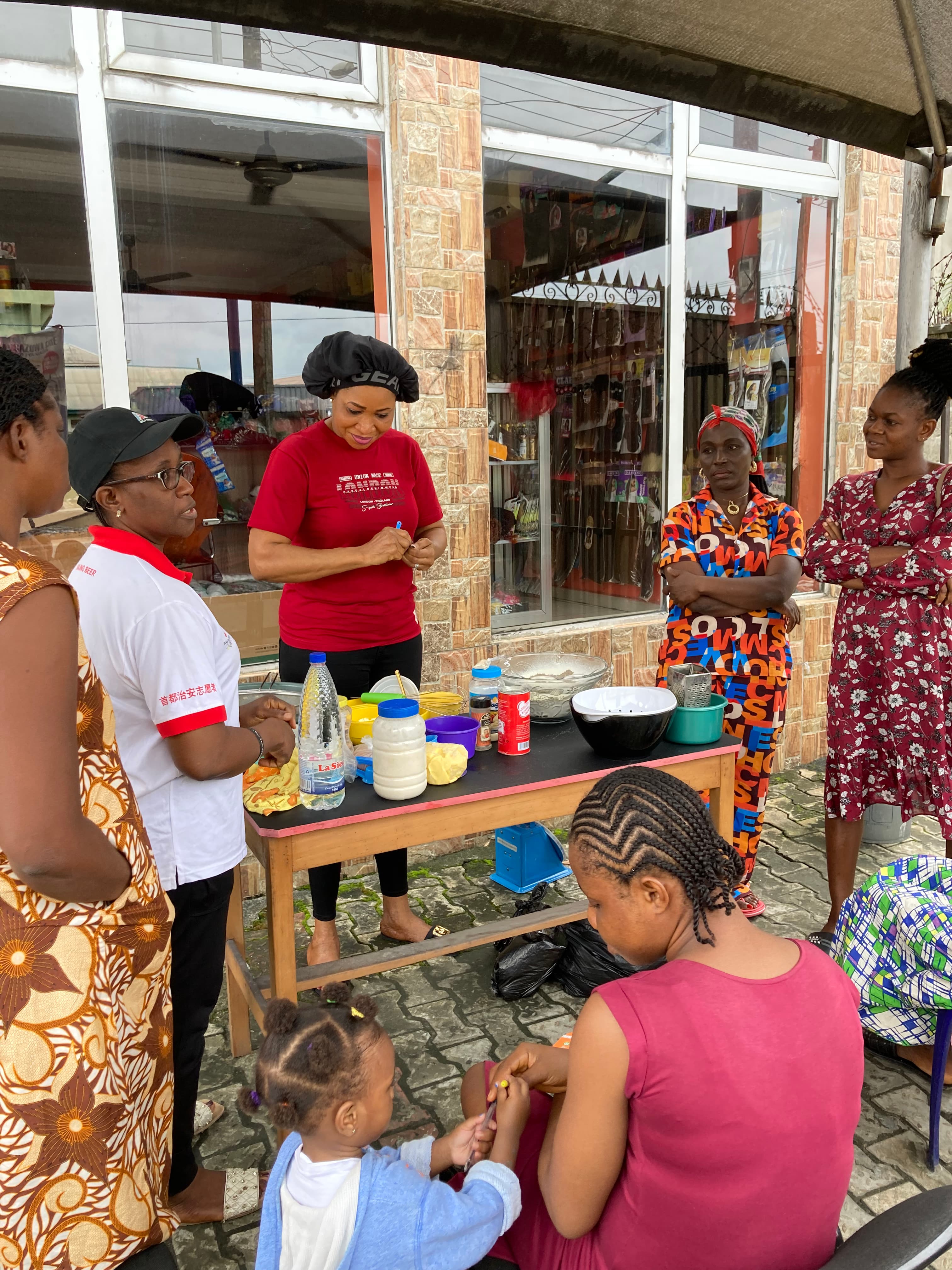 Participants taking part in a practical baking training session